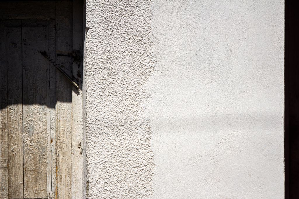 Textured wall and gate