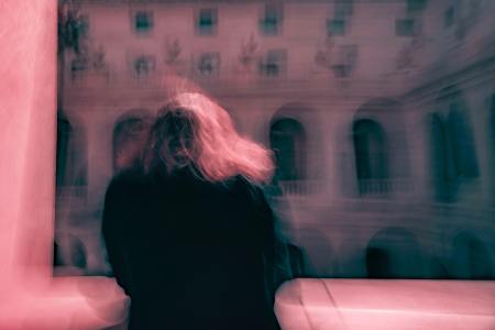 Woman standing on a balcony