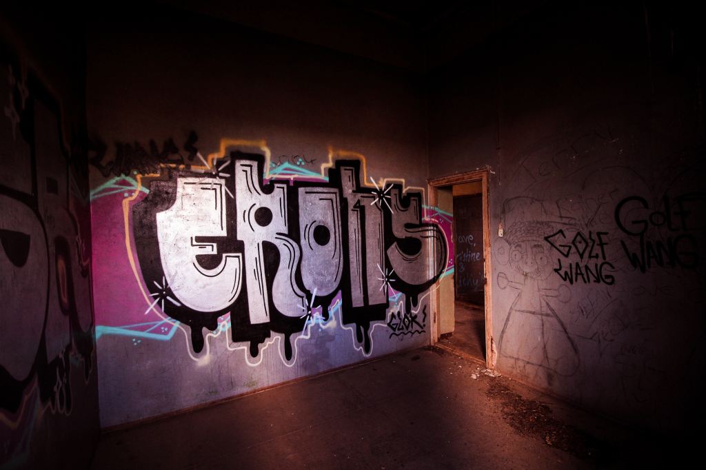 Abandoned house with graffiti walls.